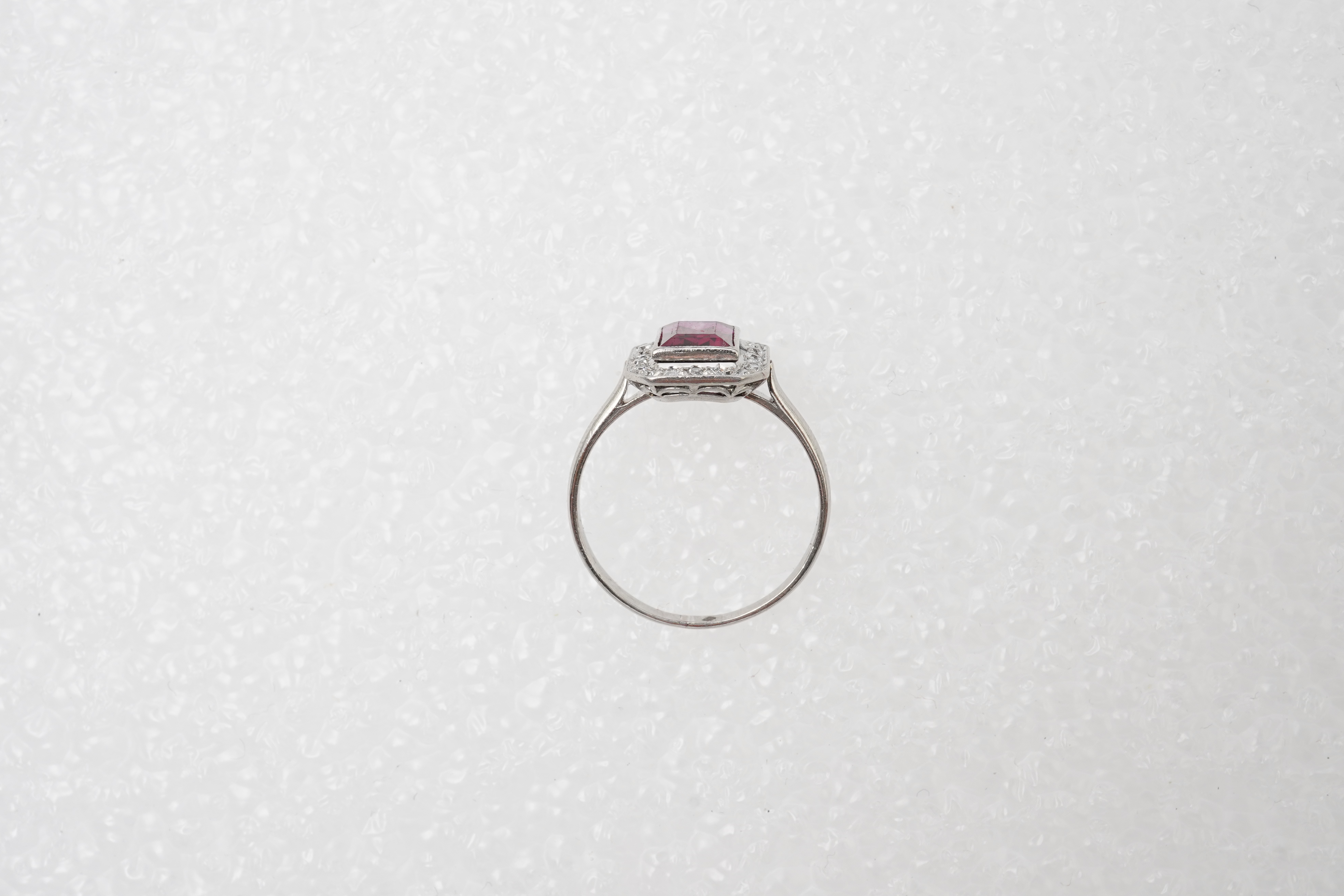 A synthetic ruby and diamond cluster ring, early 20th century